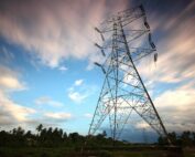 Stunning view of a towering power line against a vibrant sky, showcasing energy infrastructure in nature.