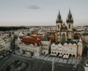 Captured from above, this image showcases Prague's iconic Old Town Square with historic architecture.