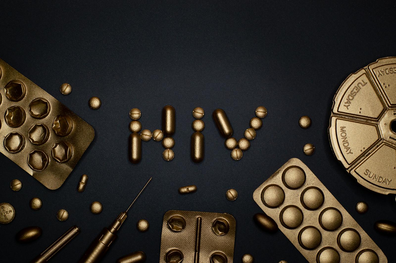 Artistic depiction of HIV with golden pills and syringes on dark background.