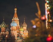 Famous Cathedral of Vasily Blessed on Red Square against dark cloudy evening sky during Christmas holidays in Russian Federation