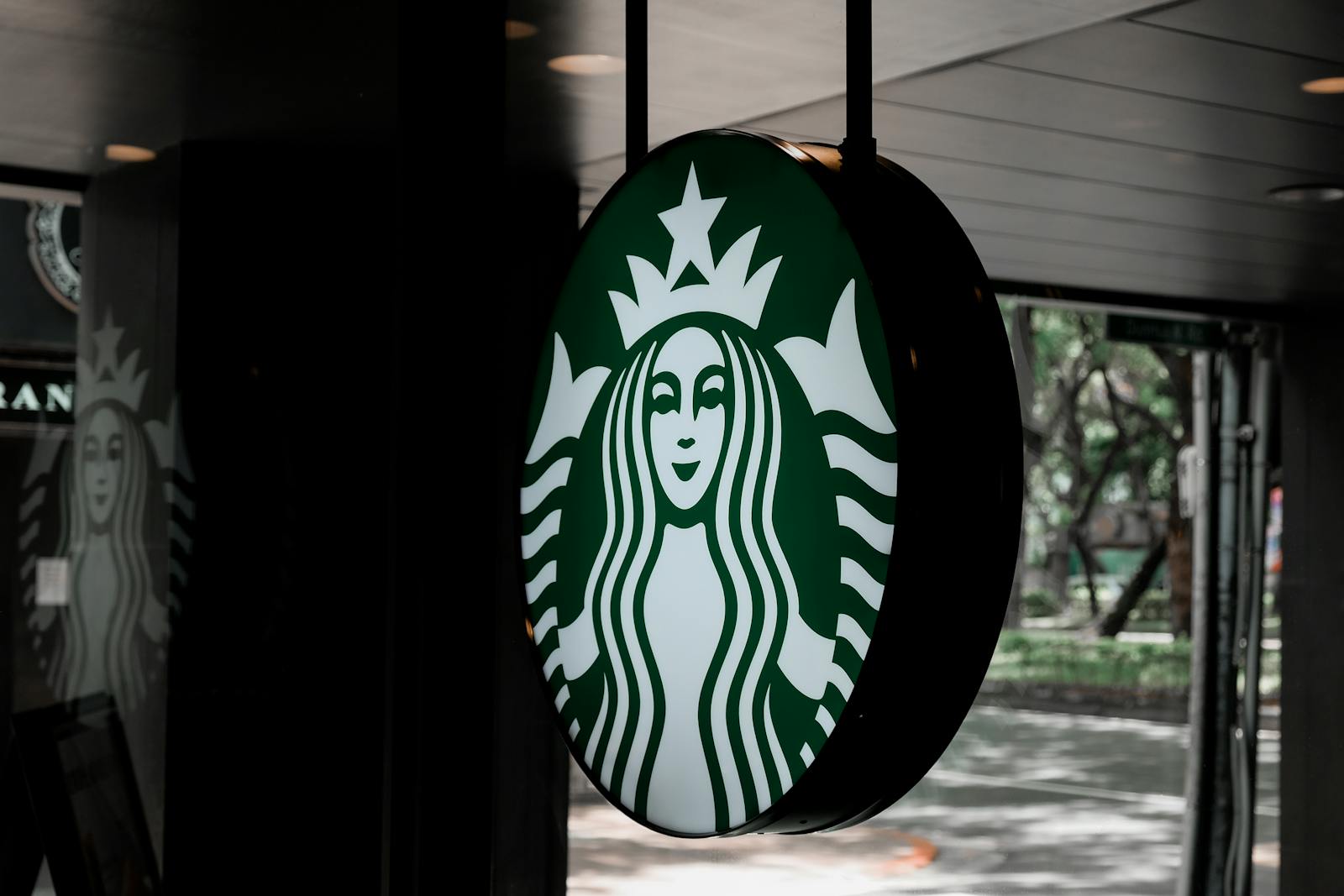 Close-up of Starbucks logo sign at a coffee shop in Taipei, Taiwan.