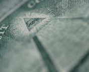 Detailed macro shot of the Eye of Providence on an American dollar bill.