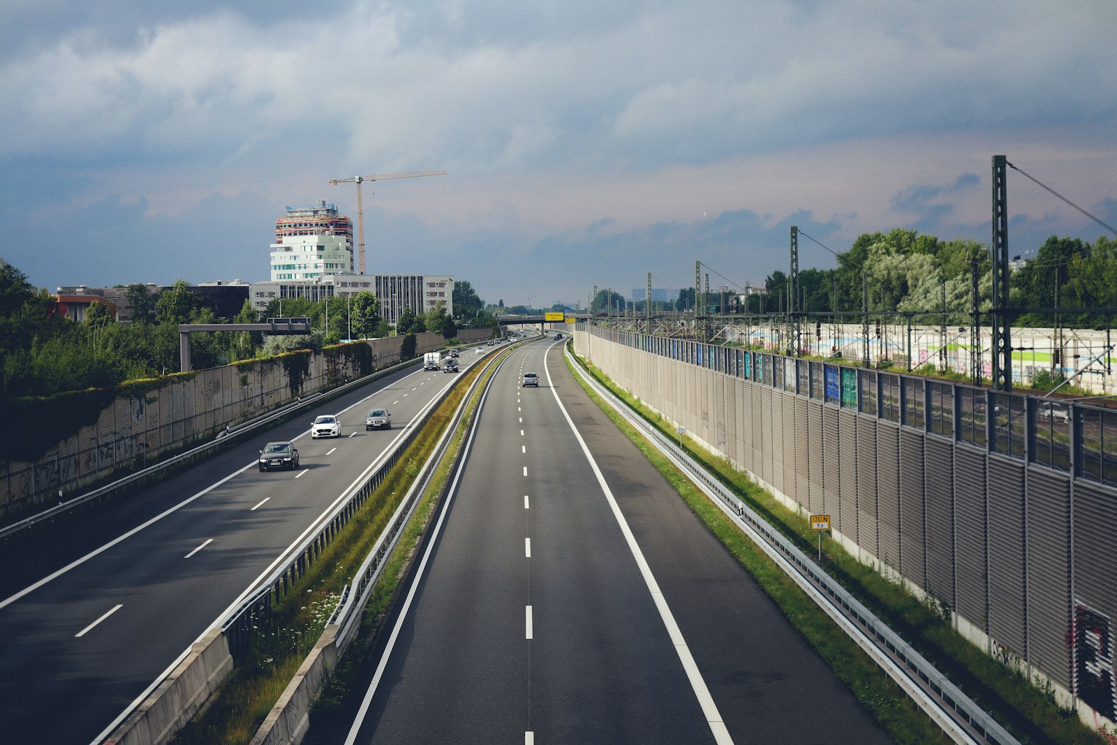 A view of a highway from the top of a bridge