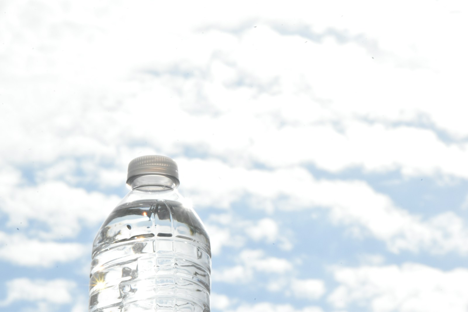 a bottle of water sitting on top of a table