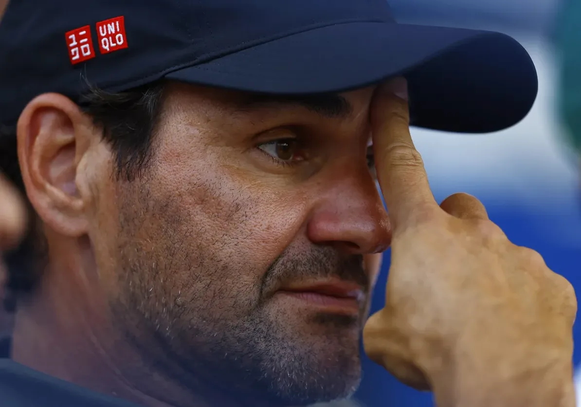 Roger Federer u Uniqlo kapici i majici