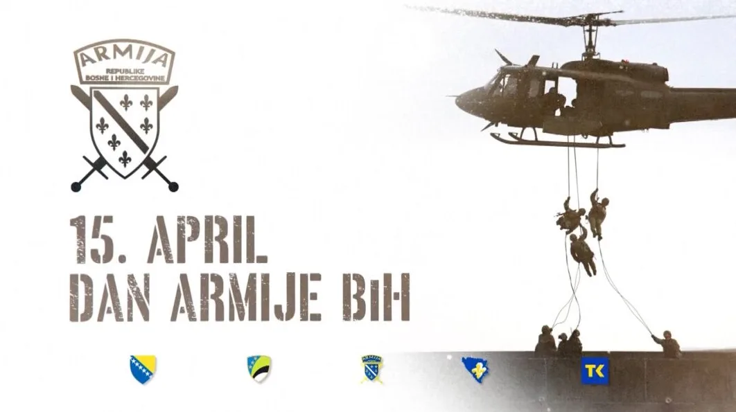 Helikopter izbacuje vojnike na konopcima, simbol Armije R BiH i natpis '15. APRIL DAN ARMIJE BiH'