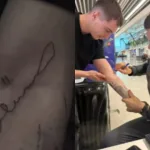 Navijač se zauvijek obilježio: Džeko mu se potpisao na ruku, a on odmah otišao na tetovažu