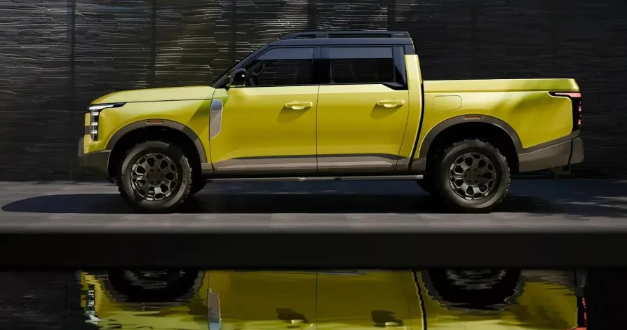 Futuristički pikap vozilo limun žute boje s tamnim krovom i naplatcima