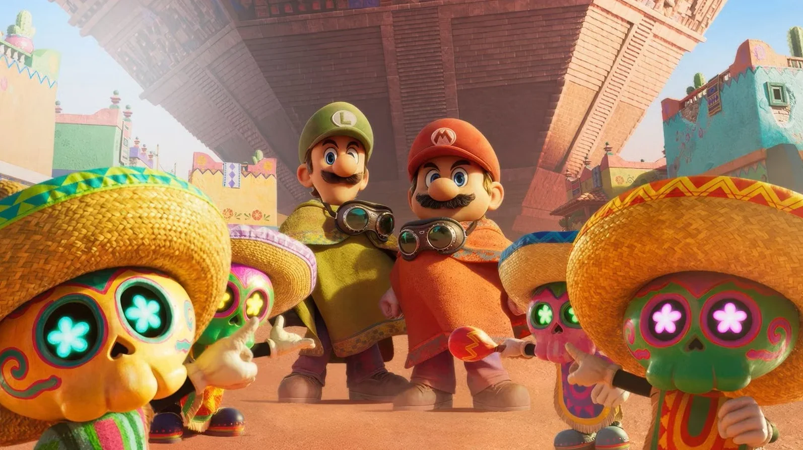 Mario i Luigi u stilizovanim meksičkim pončima i šeširima, sa likovima poput šećernih lobanja u pozadini.