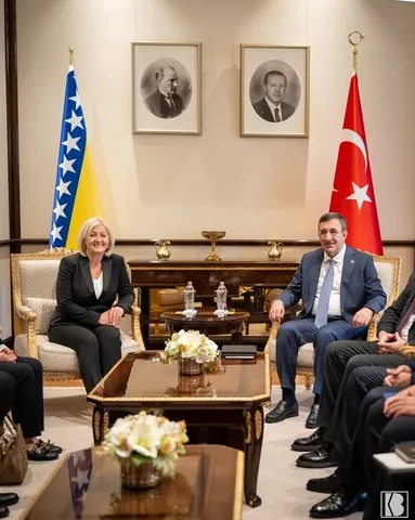 Gospođa Borjana Krišto, predsjedavajuća Vijeća ministara Bosne i Hercegovine, sjedi sa turskim zvaničnikom na sastanku.