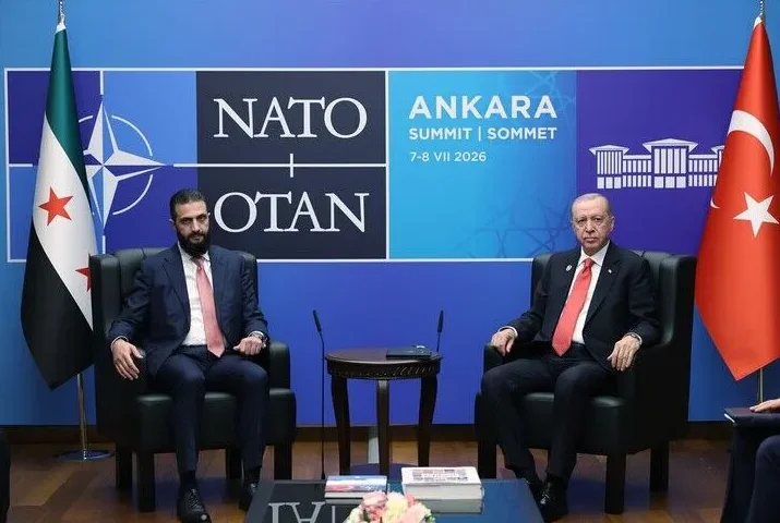 Recep Tayyip Erdoğan i sirijski opozicioni lider sjede jedan pored drugog uoči samita NATO-a.