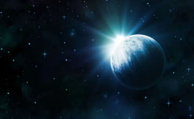Plava planeta u svemiru sa izlaskom sunca